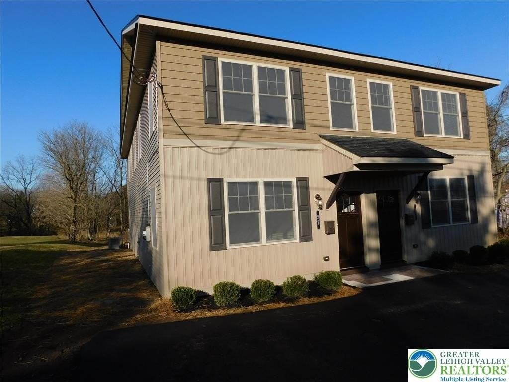 25 John Aly - Photo 2 of 15