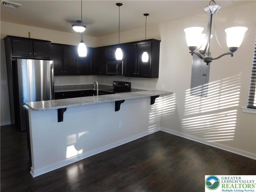 25 John Aly - Photo 3 of 15
