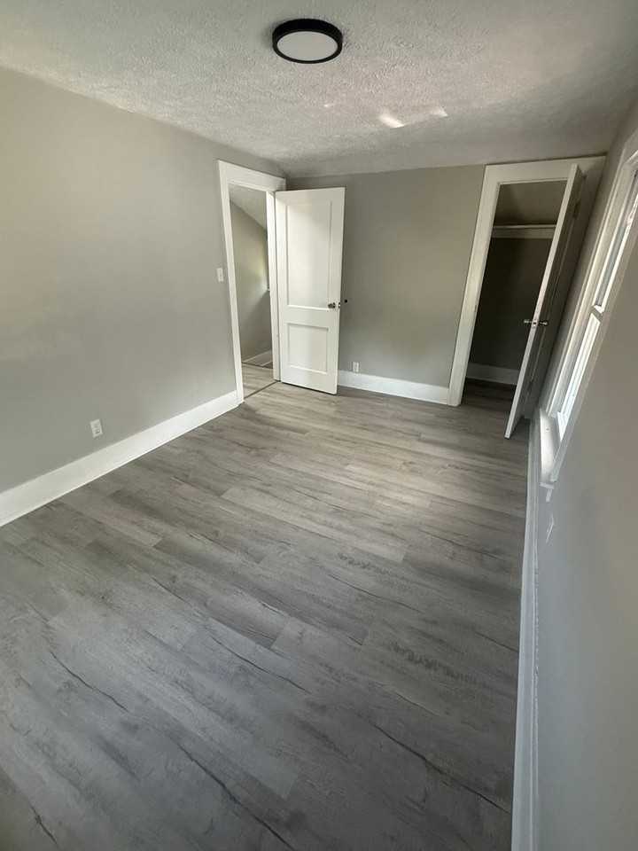 115 E 30th St - Photo 5 of 6