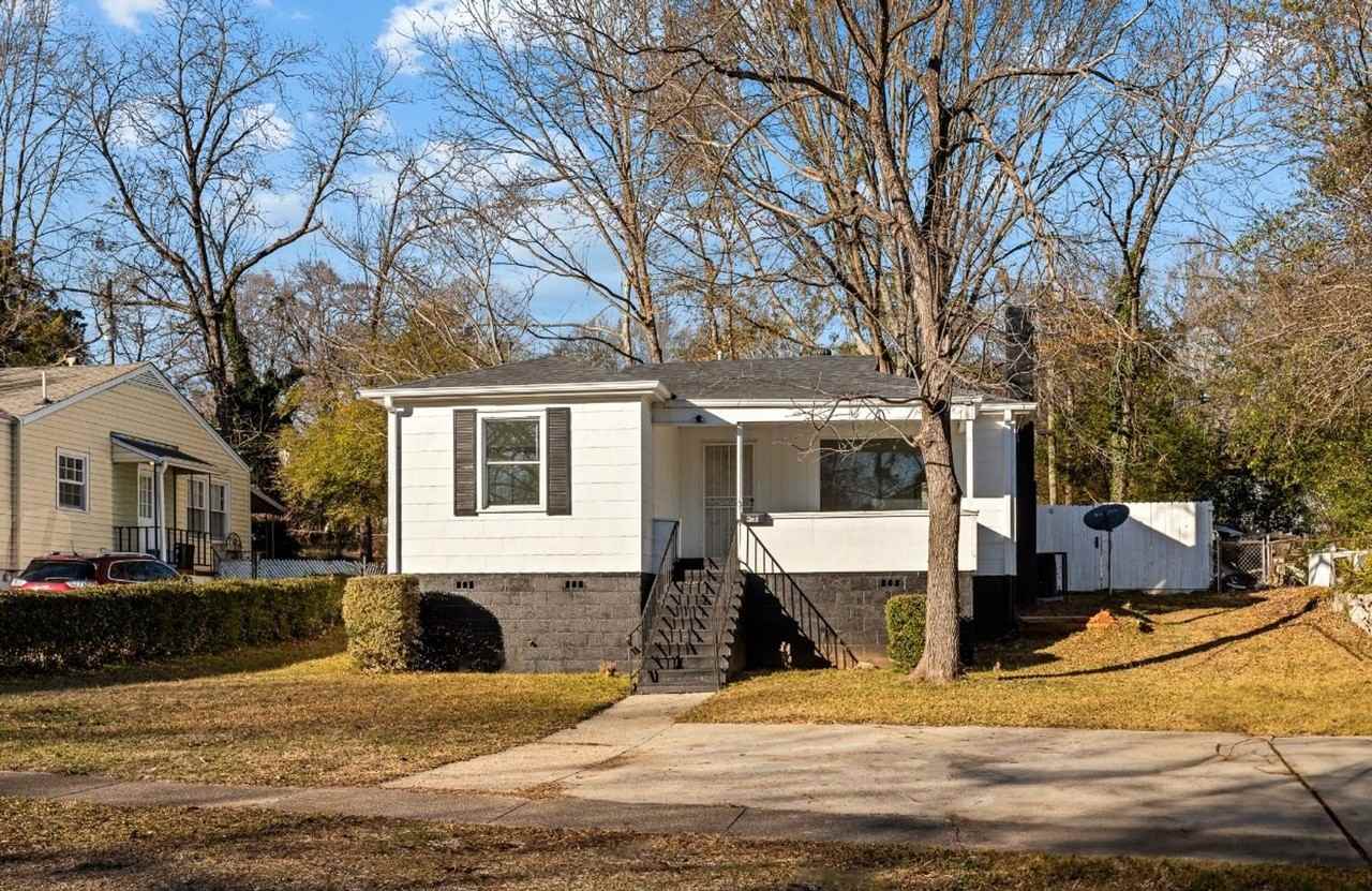 9036 Beverly Dr N - Photo 2 of 11