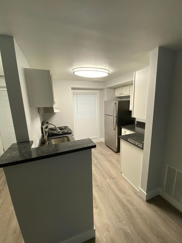 WOODRIDGE APARTMENTS - Photo 2 of 12