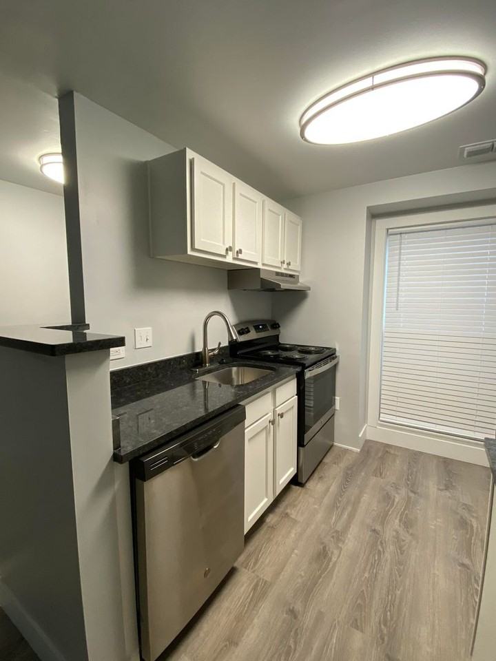 WOODRIDGE APARTMENTS - Photo 3 of 12