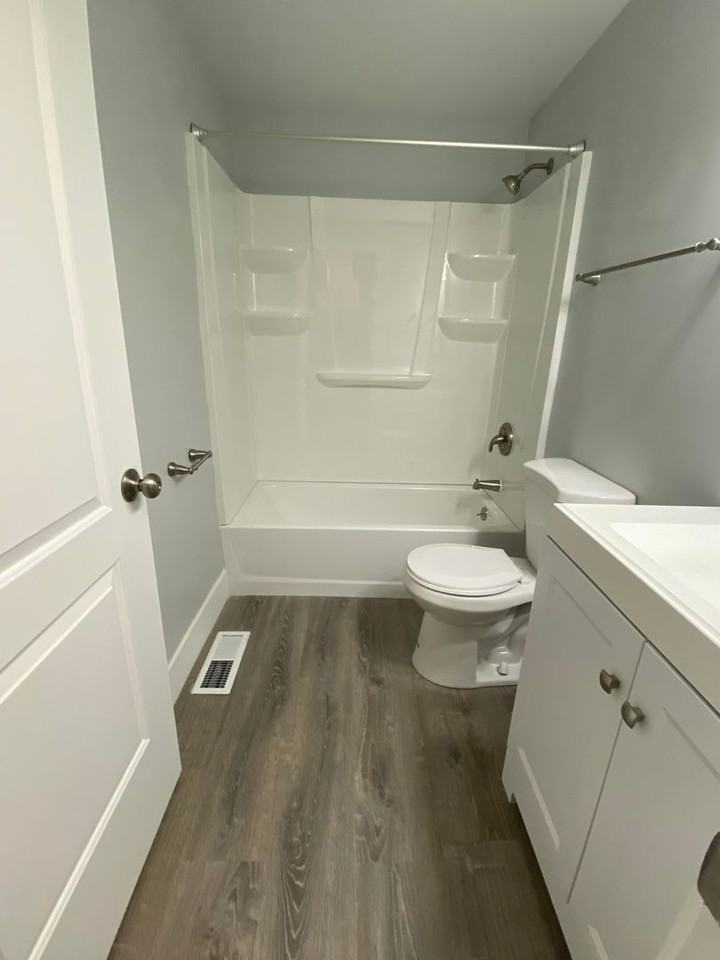 WOODRIDGE APARTMENTS - Photo 6 of 12