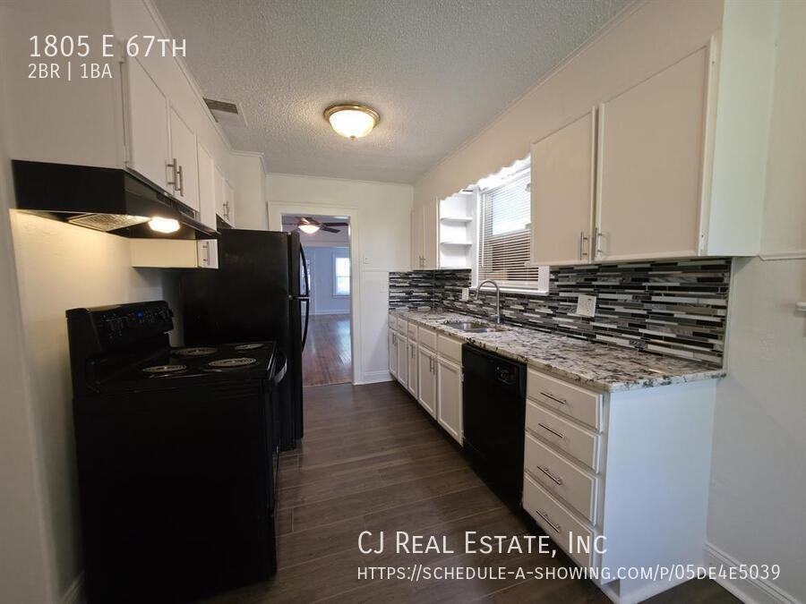 1805 E 67th Ter - Photo 6 of 11