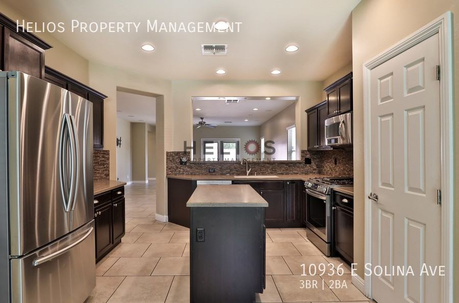 10936 E Solina Ave - Photo 5 of 34