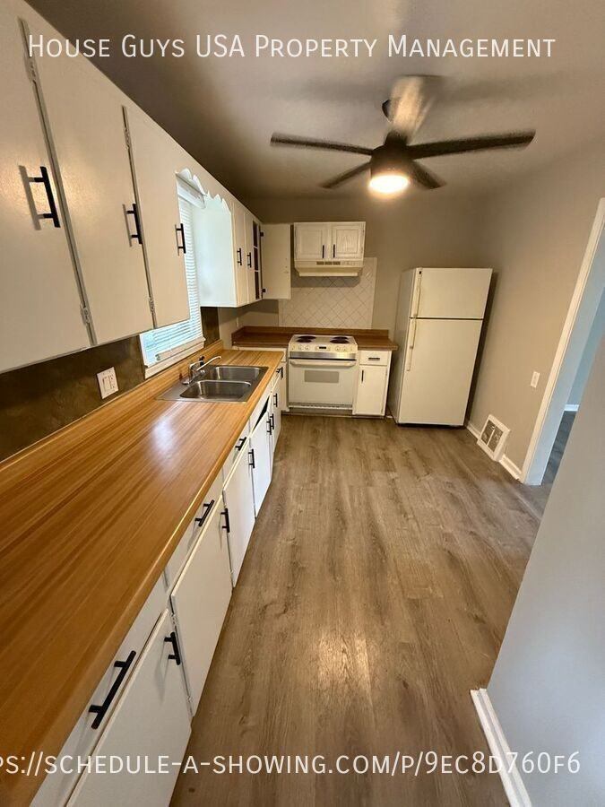 4612 E Linwood Blvd - Photo 3 of 7
