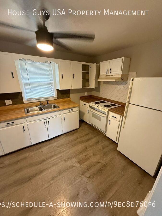 4612 E Linwood Blvd - Photo 4 of 7