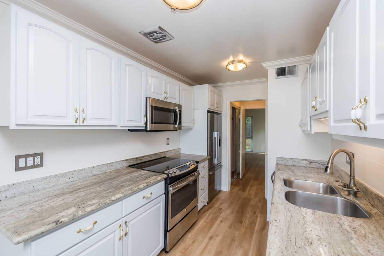 5-65 RODEO Apartments - Photo 5 of 49