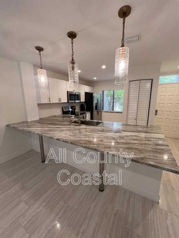 2500 Presidential Way - Photo 4 of 18