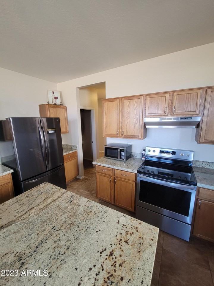 12050 W Carlota Ln - Photo 2 of 20