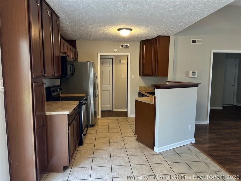 6915 Skyhawk Dr - Photo 5 of 16