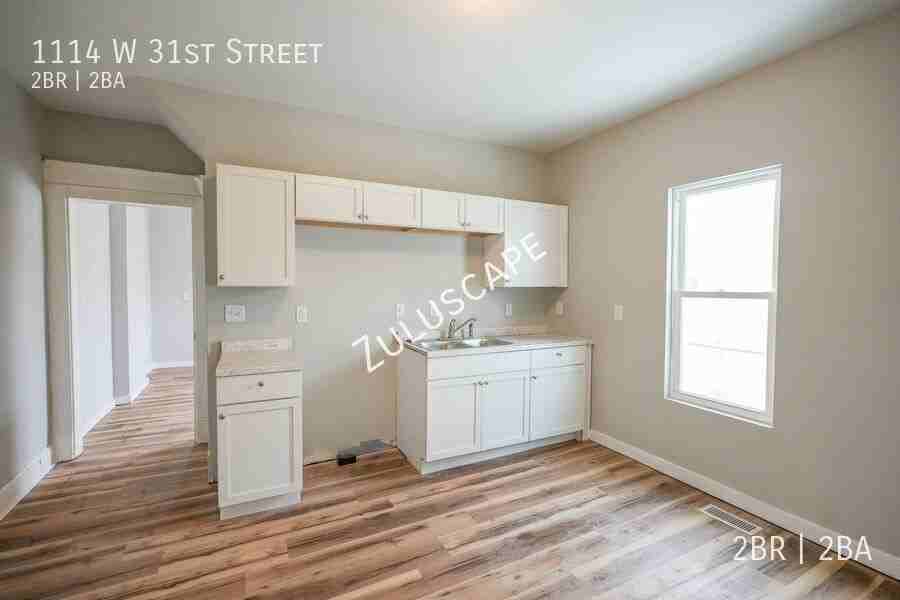 1114 W 31st St - Photo 7 of 22