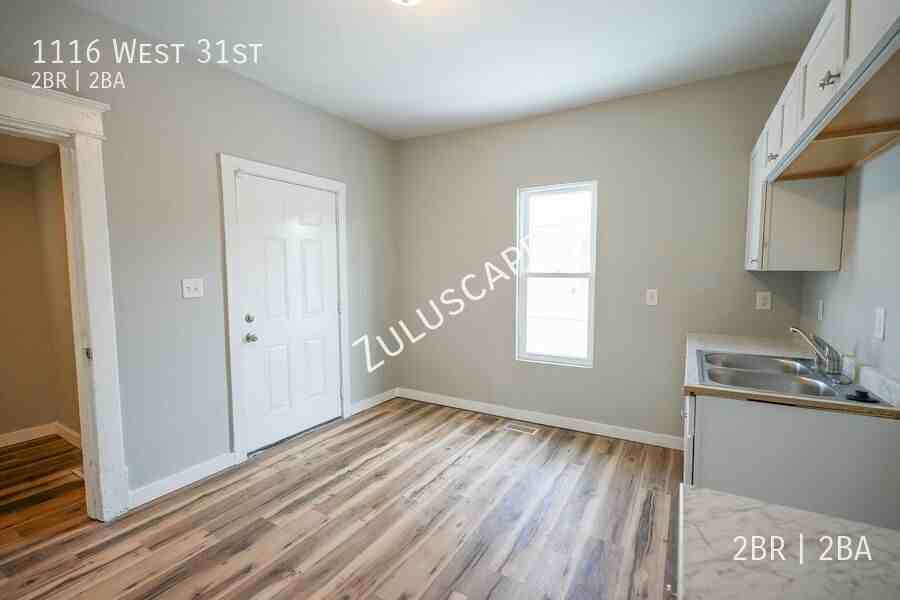 1116 W 31st St - Photo 6 of 21