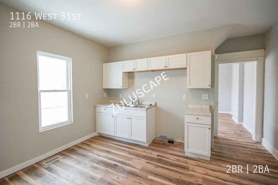 1116 W 31st St - Photo 7 of 21