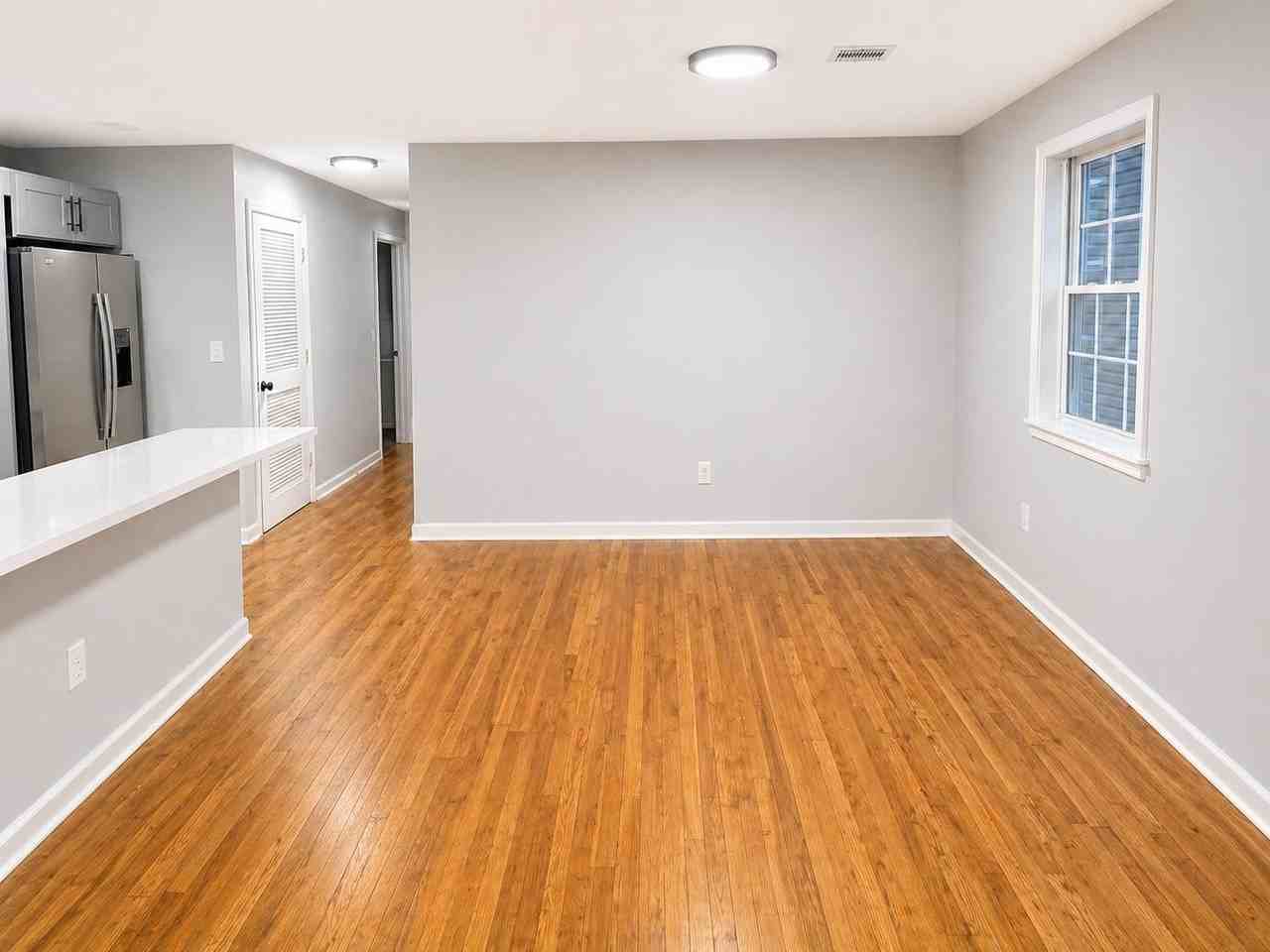 214 Clerk St #2 - Photo 3 of 15