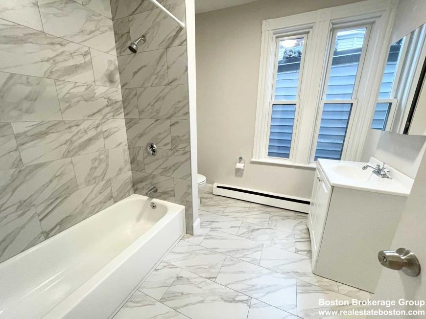1584 Tremont St - Photo 7 of 9