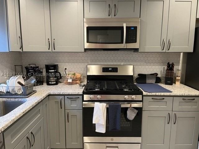 1247 S Newkirk St - Photo 3 of 16
