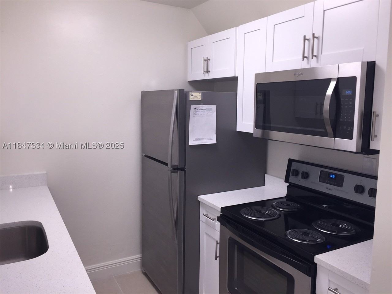 10740 N Kendall Dr #L14 - Photo 2 of 17