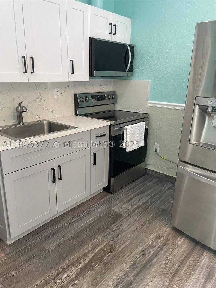 240 Ne 27th St #1 - Photo 2 of 16