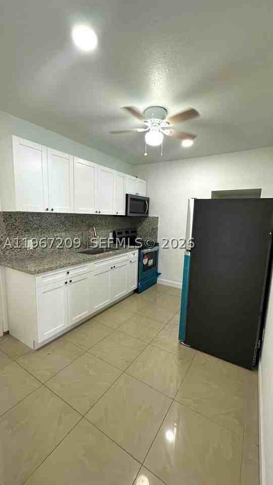 1770 Nw 19th Ter #G - Photo 5 of 12