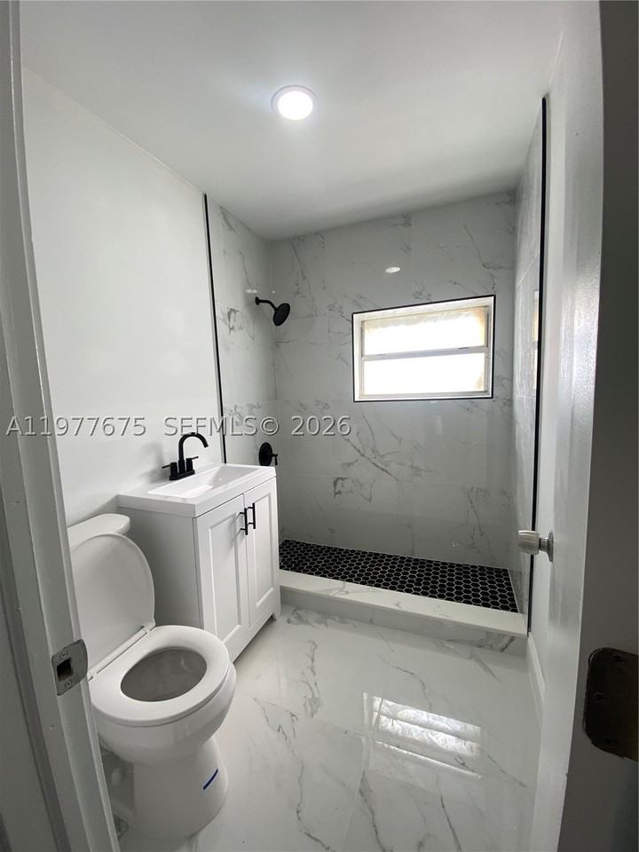 894 Nw 108th St #1 - Photo 3 of 6
