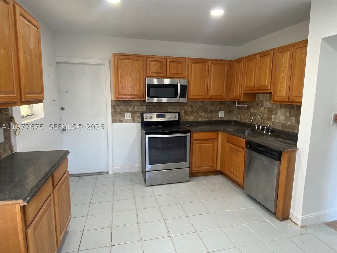 894 Nw 108th St #1 - Photo 4 of 6