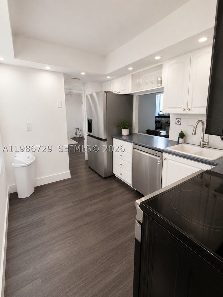 299 Nw 52nd Ter #PHX - Photo 5 of 16