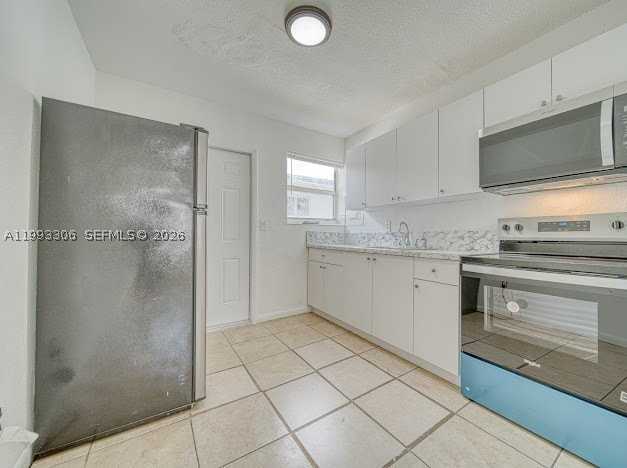 1887 Nw 48th St #1887 - Photo 4 of 15