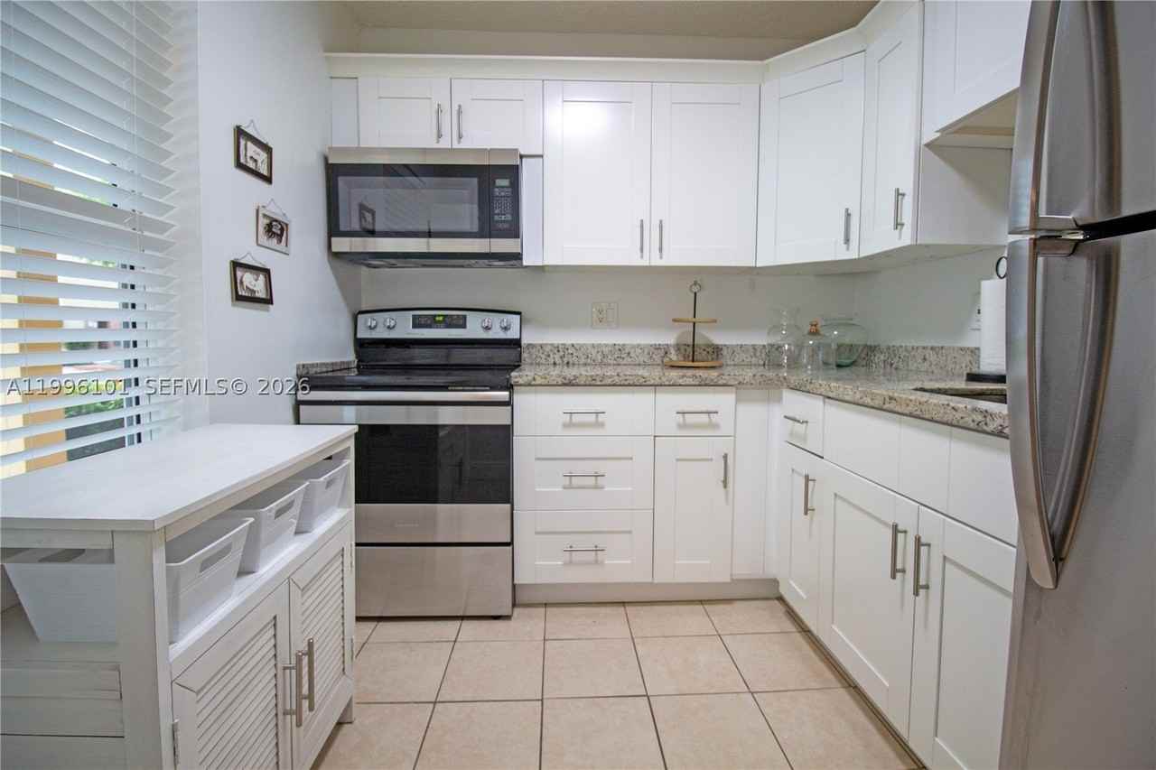6020 Nw 64th Ave #108 - Photo 2 of 19