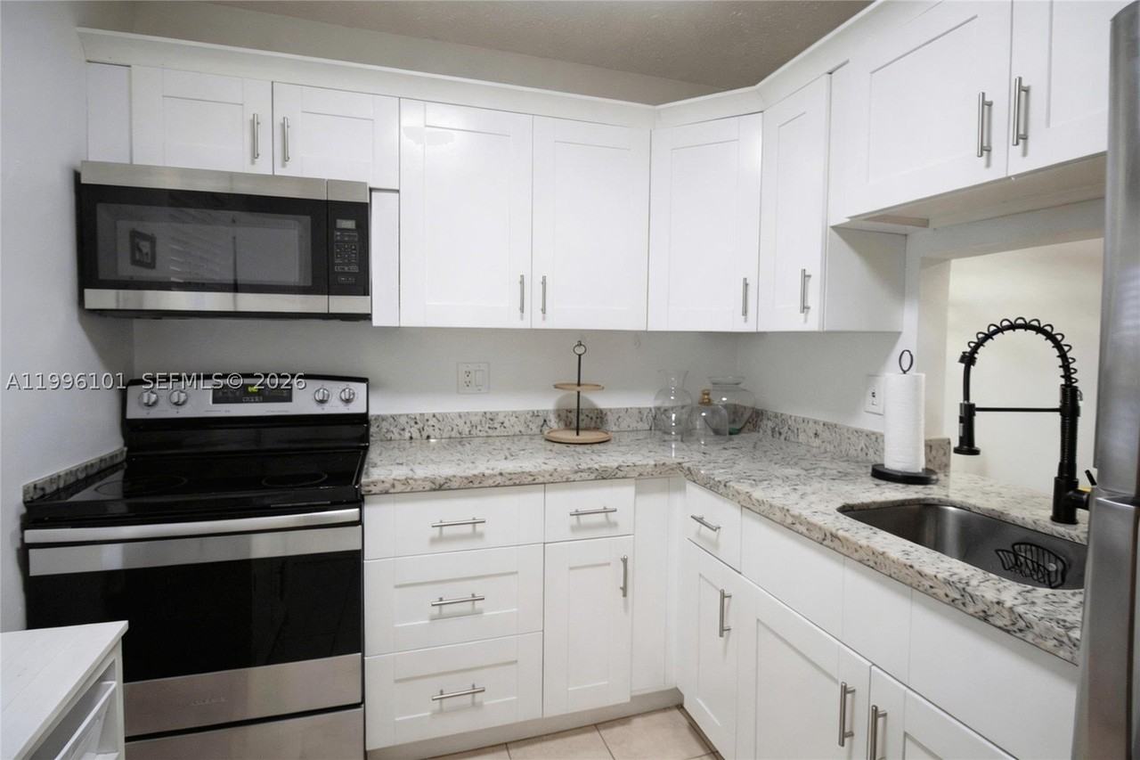 6020 Nw 64th Ave #108 - Photo 4 of 19