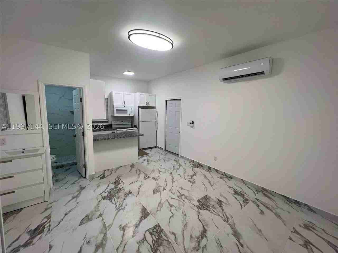 1720 Nw 180th Ter #1 - Photo 5 of 14