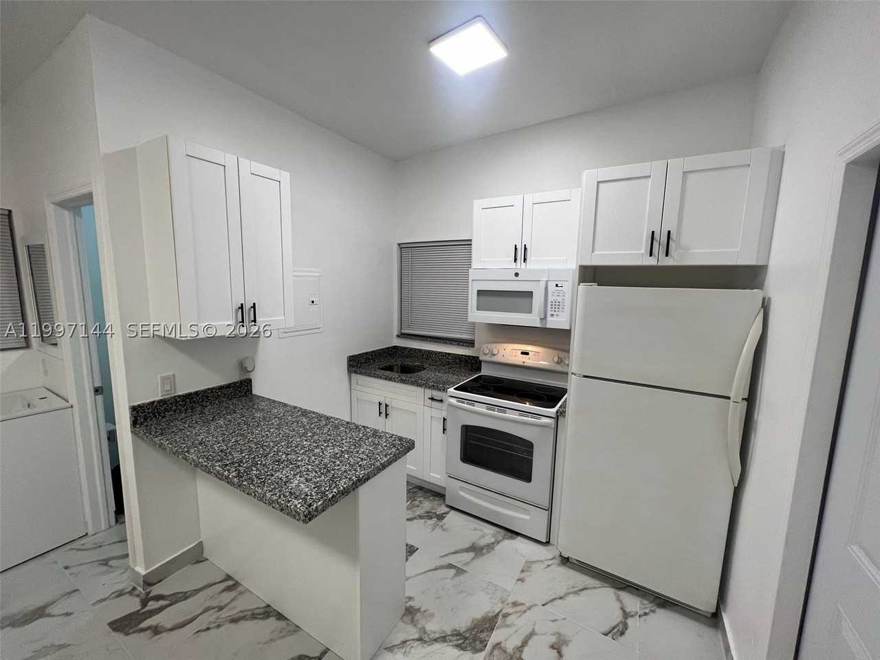 1720 Nw 180th Ter #1 - Photo 6 of 14