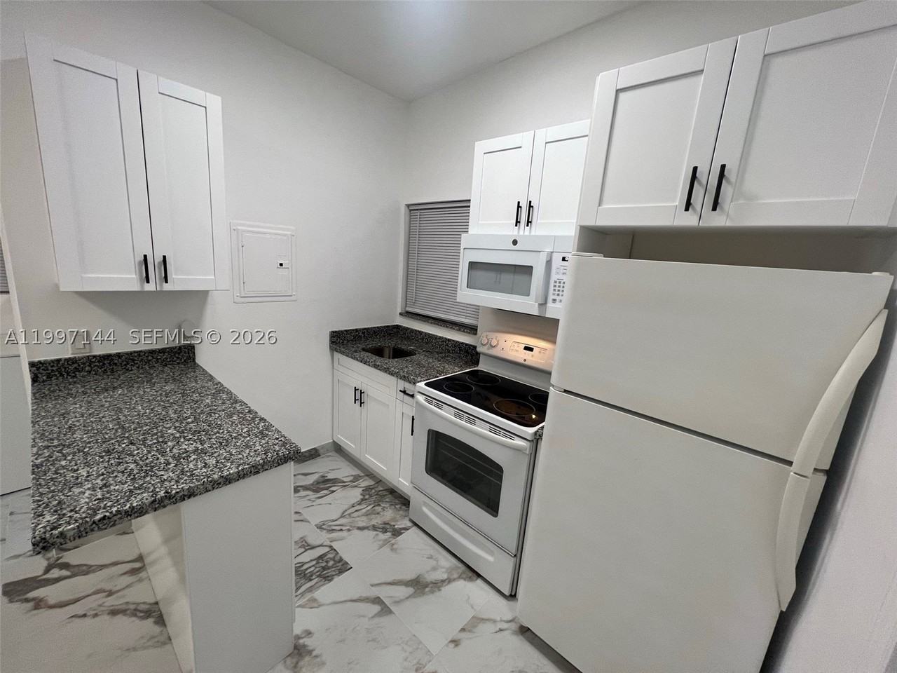 1720 Nw 180th Ter #1 - Photo 7 of 14