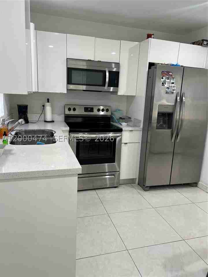 2954 Nw 57th St #2954 - Photo 2 of 15