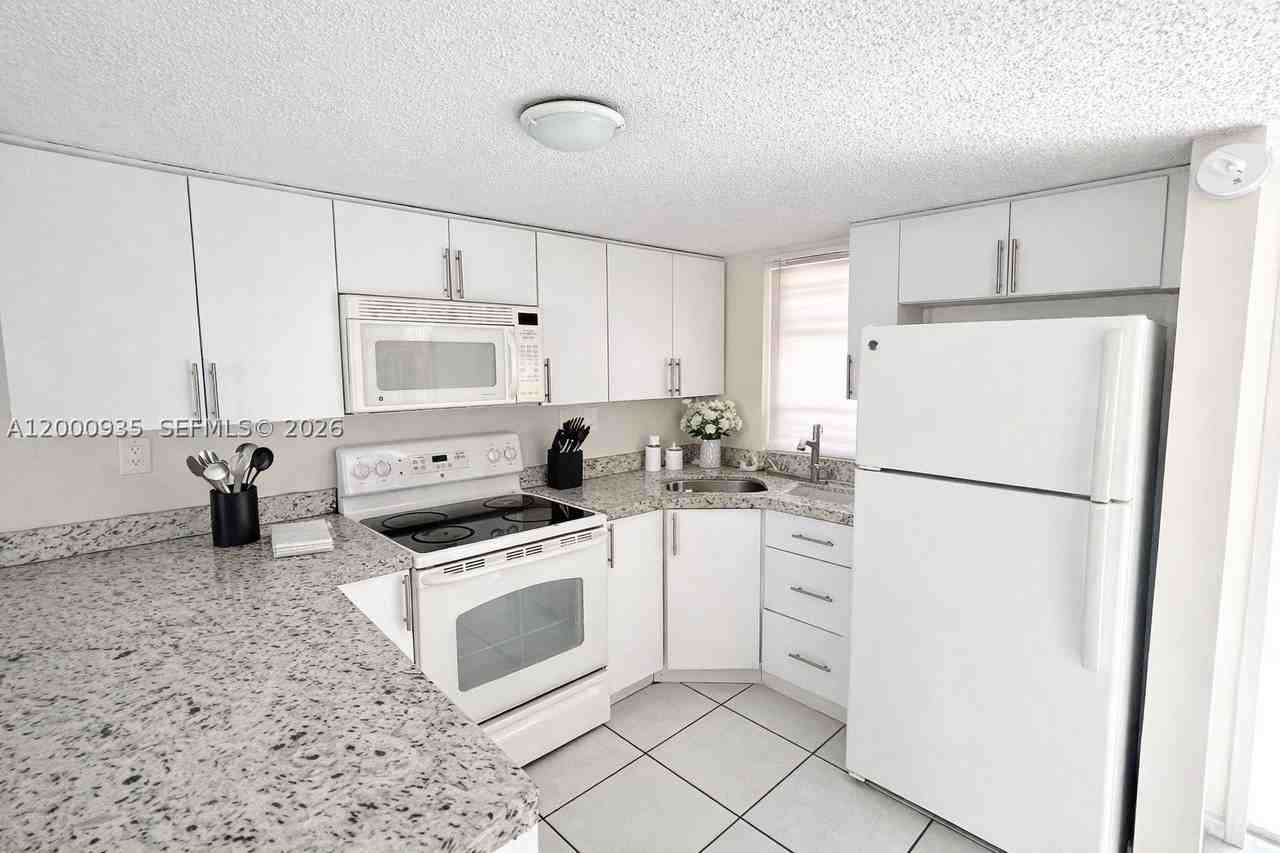 5575 W 26th Ct #203 - Photo 4 of 46