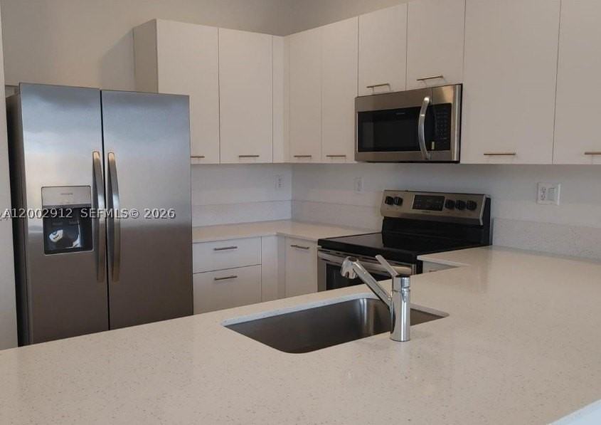 2353 Nw 122nd Ter #0 - Photo 4 of 44