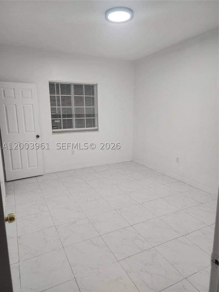 6972 Nw 179th St #203-4 - Photo 2 of 10