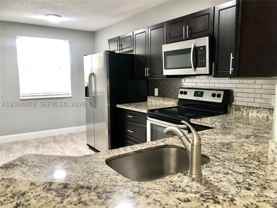 8761 Wiles Rd #306 - Photo 1 of 1