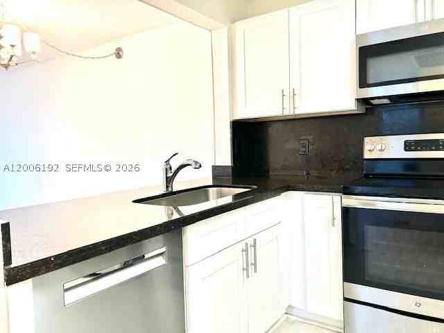 871 Ne 207th Ter #4-101 - Photo 3 of 18