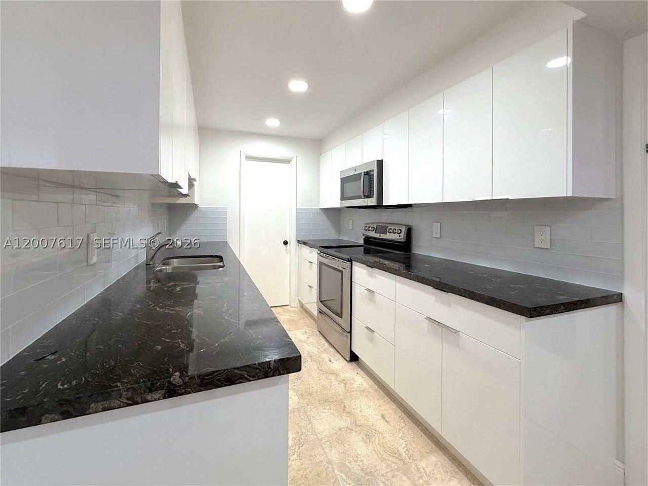1075 92nd St #201 - Photo 3 of 15