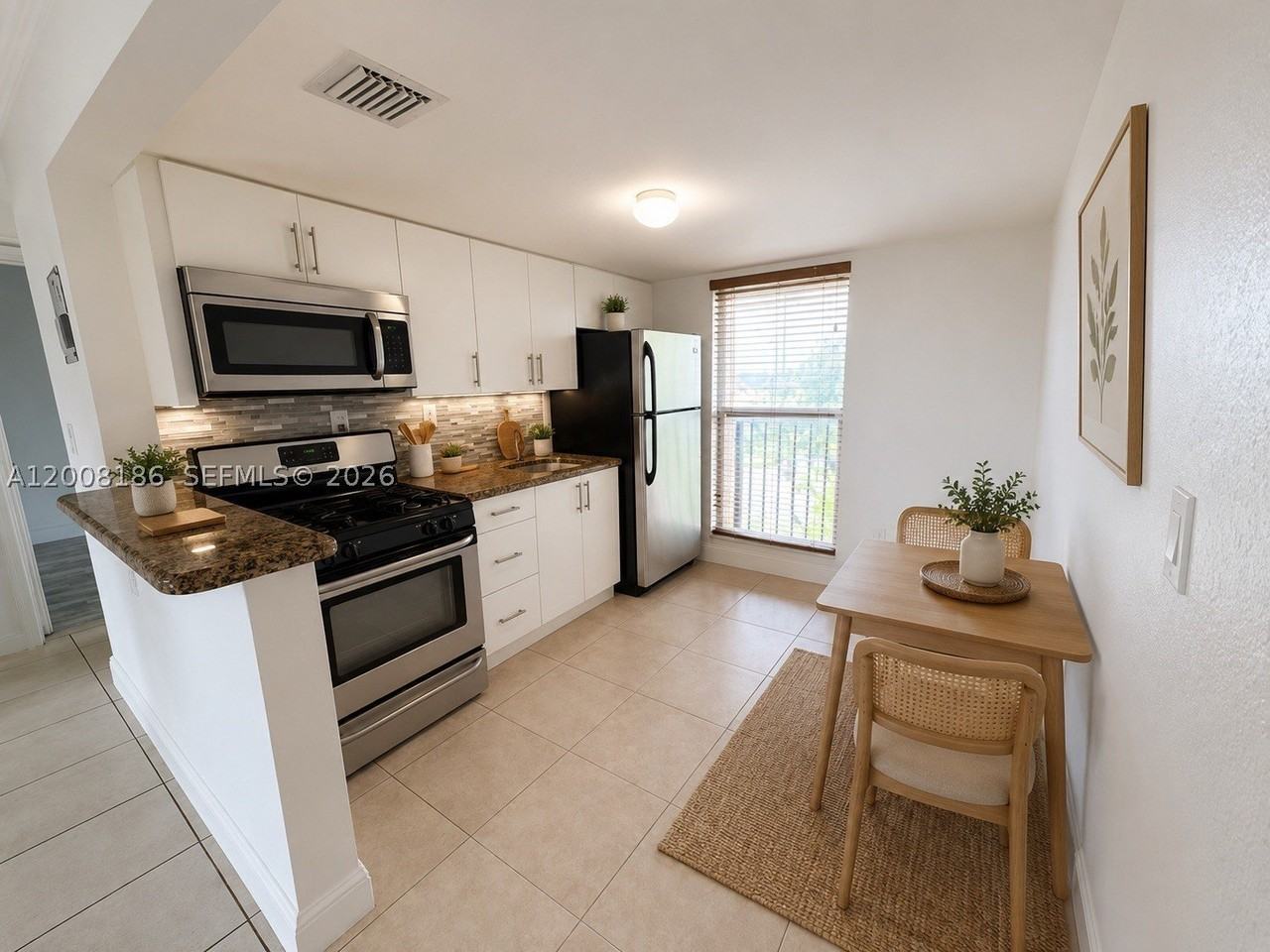 241 S Royal Poinciana Blvd #310 - Photo 3 of 9