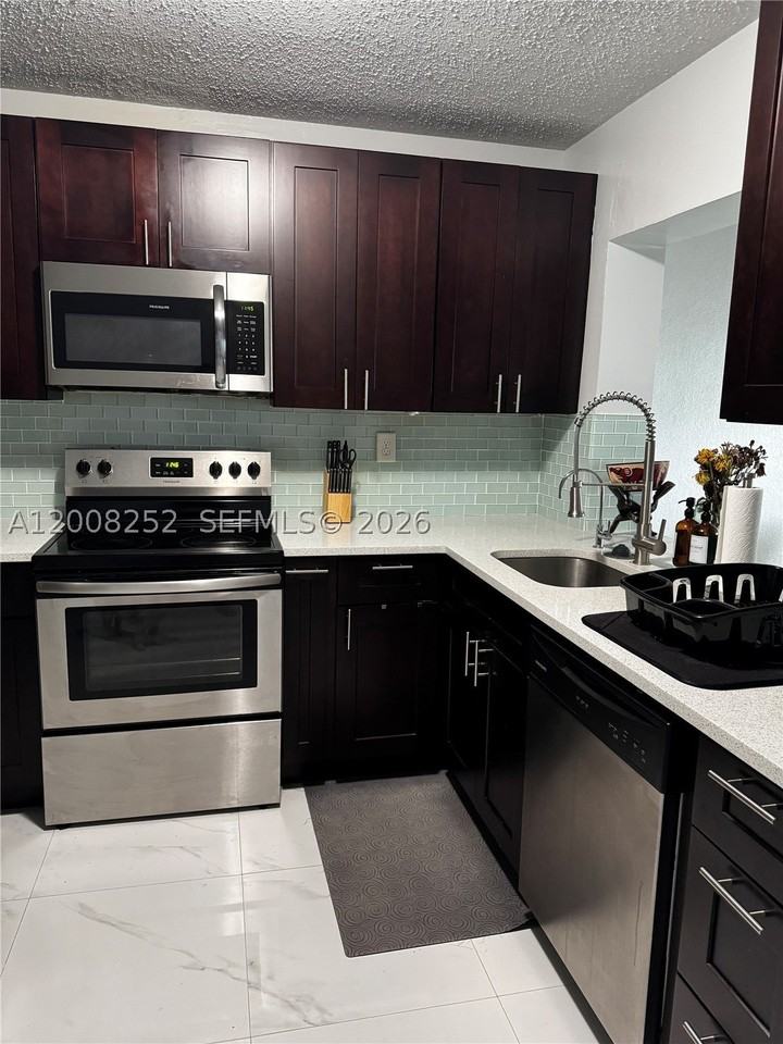 1740 Ne 56th St - Photo 4 of 25