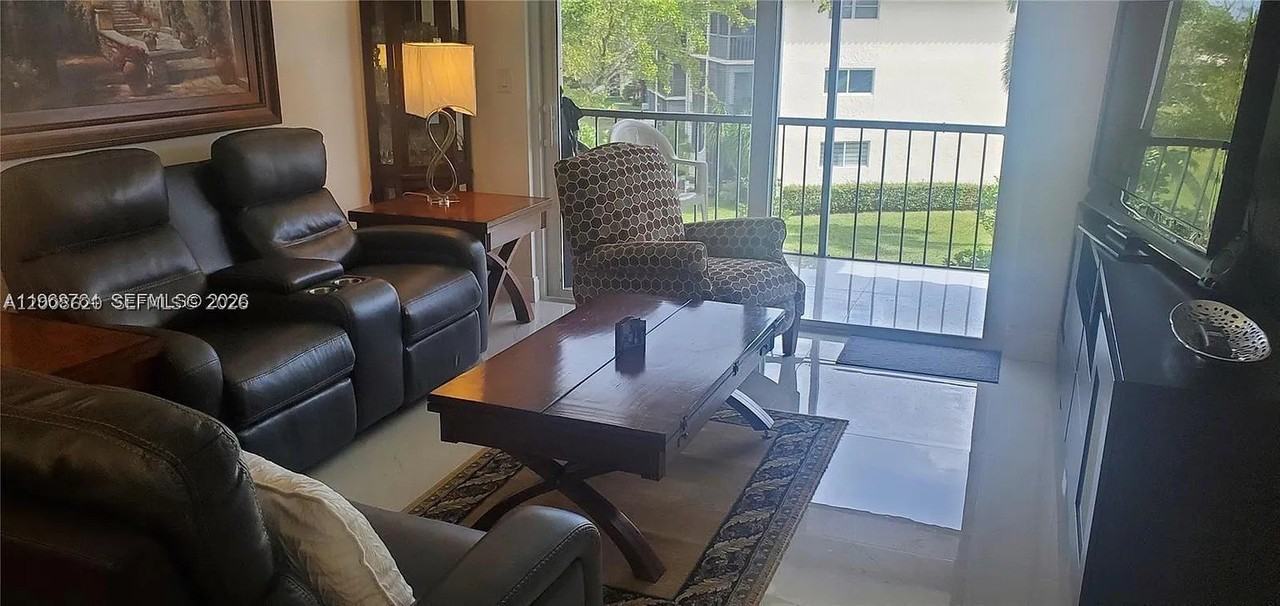 9720 S Hollybrook Lake Dr #303 - Photo 3 of 11