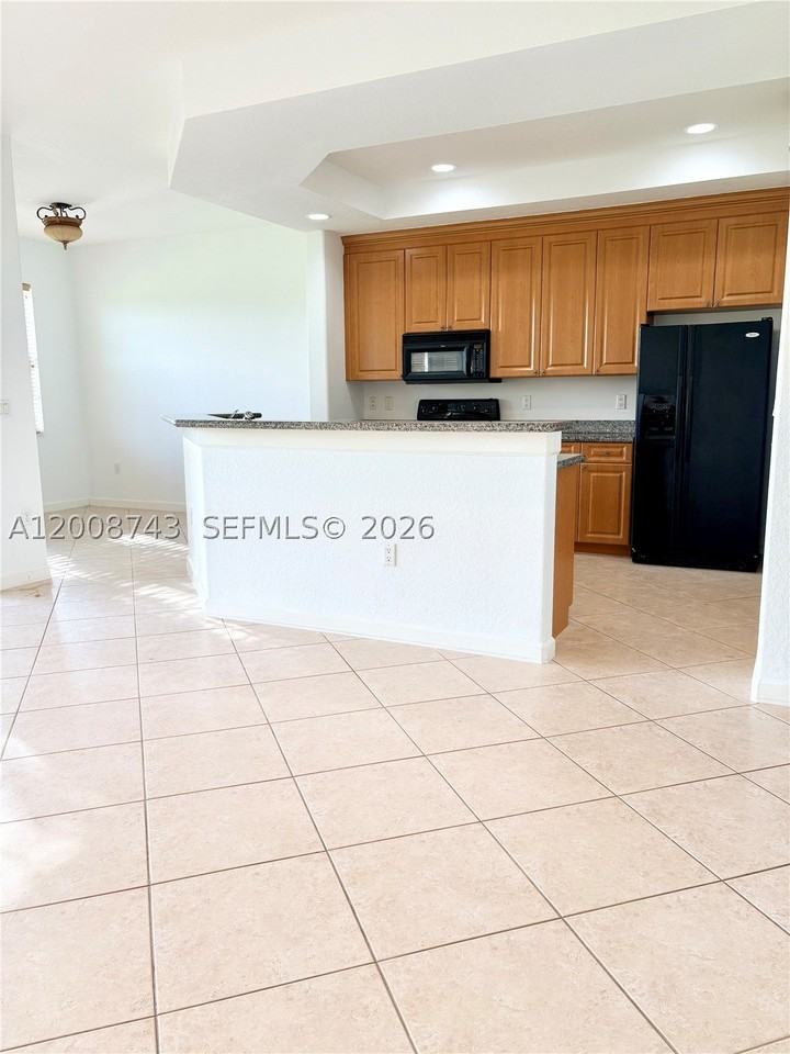 7993 Nw 128th Ln #13B - Photo 3 of 24