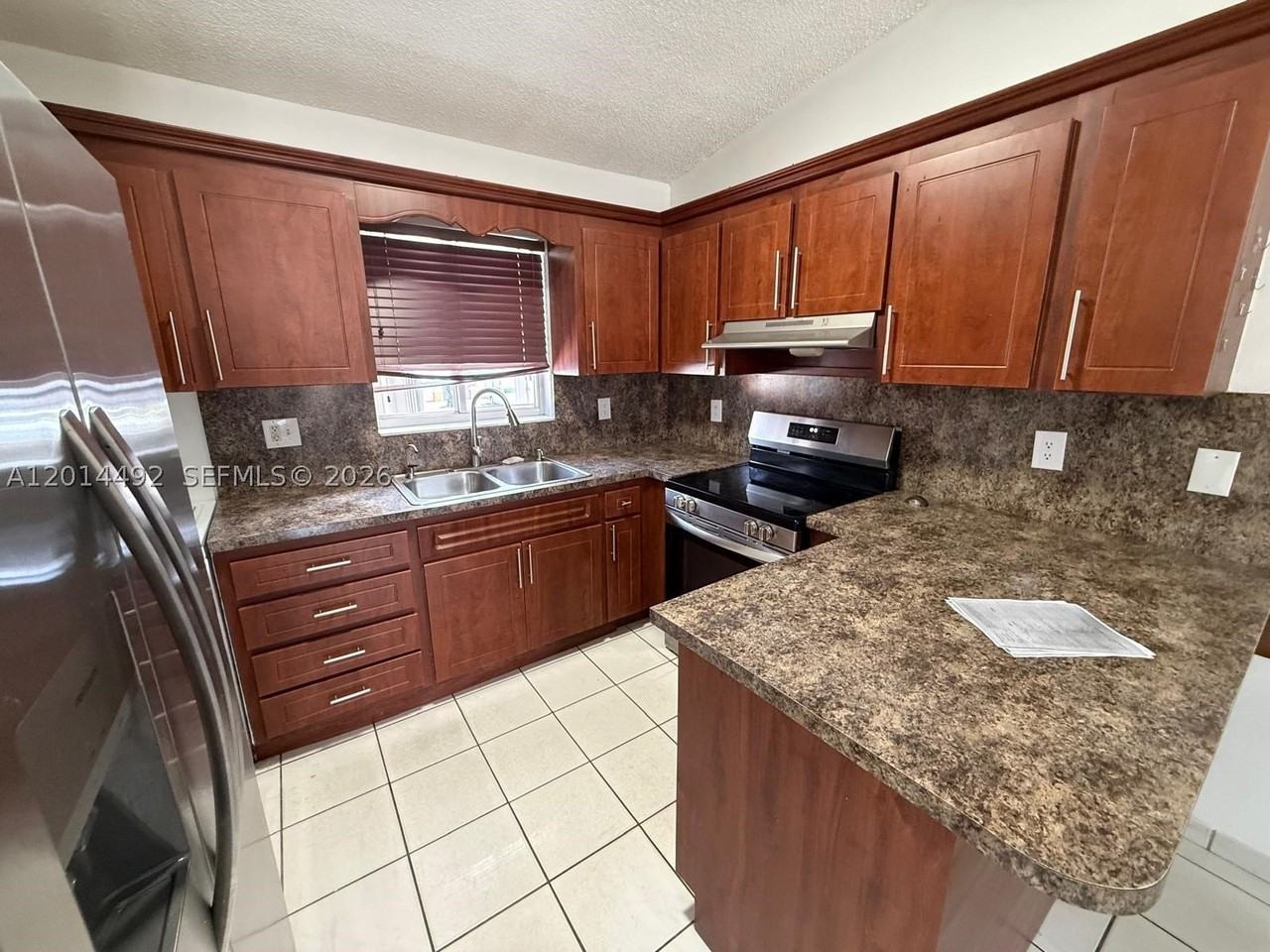 2212 W 74th St #201-28 - Photo 2 of 12