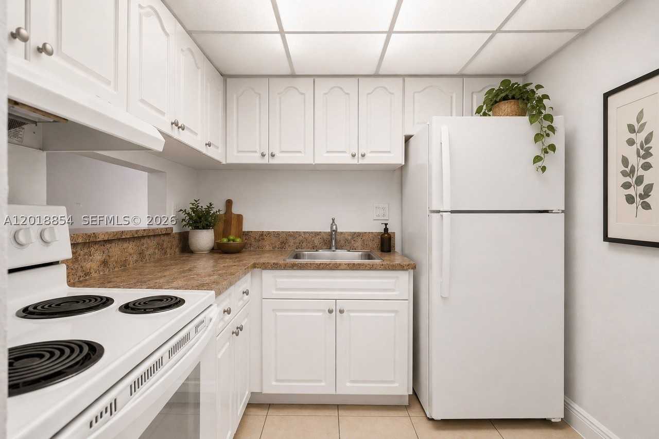9483 Sw 76th St #N1 - Photo 3 of 12