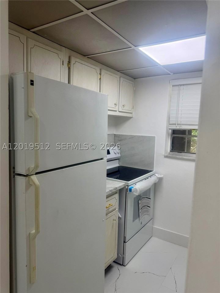 3700 Nw 62nd Ave #107 - Photo 5 of 7
