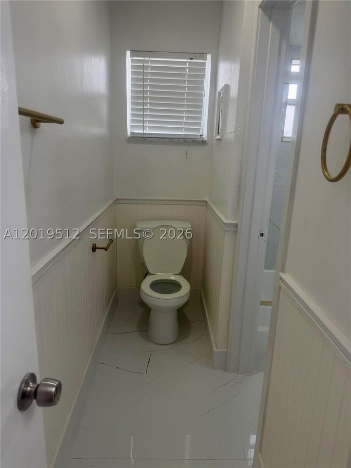 3700 Nw 62nd Ave #107 - Photo 6 of 7