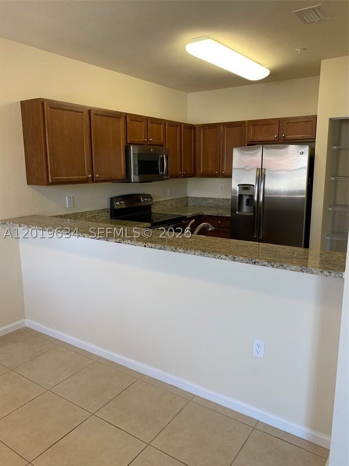 8930 Nw 97th Ave #209 - Photo 5 of 31