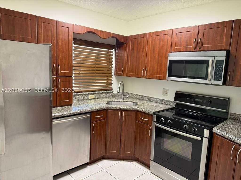 4484 Carambola Cir S #27321 - Photo 2 of 9